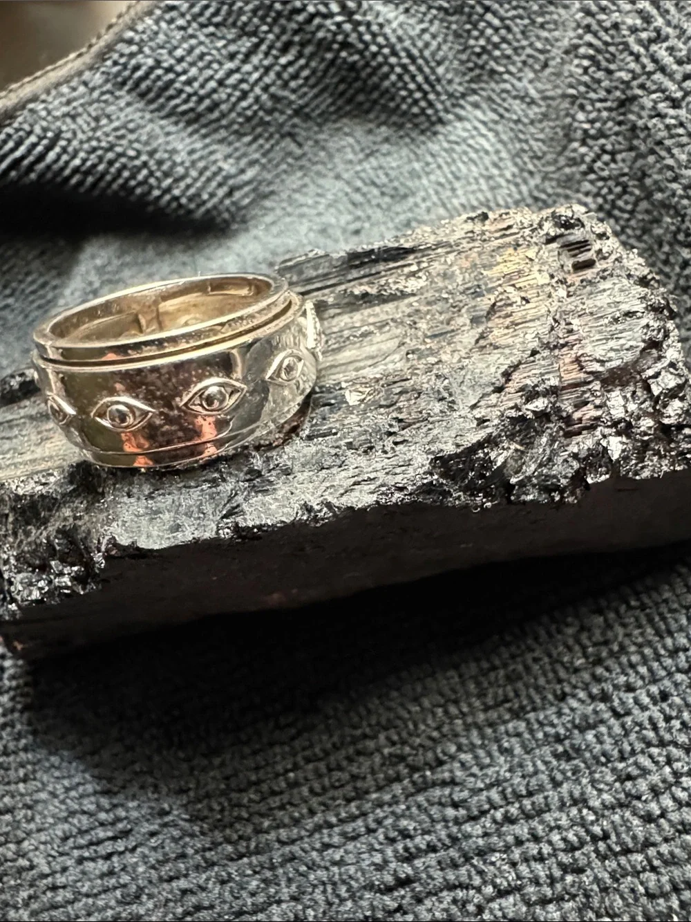 Silver Spinner Band Ring with Blue Stone Evil Eye Accent